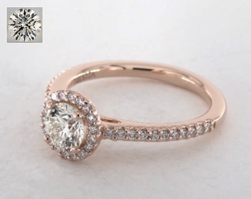 0.63 carat halo engagement ring in 14K rose gold for $2,500