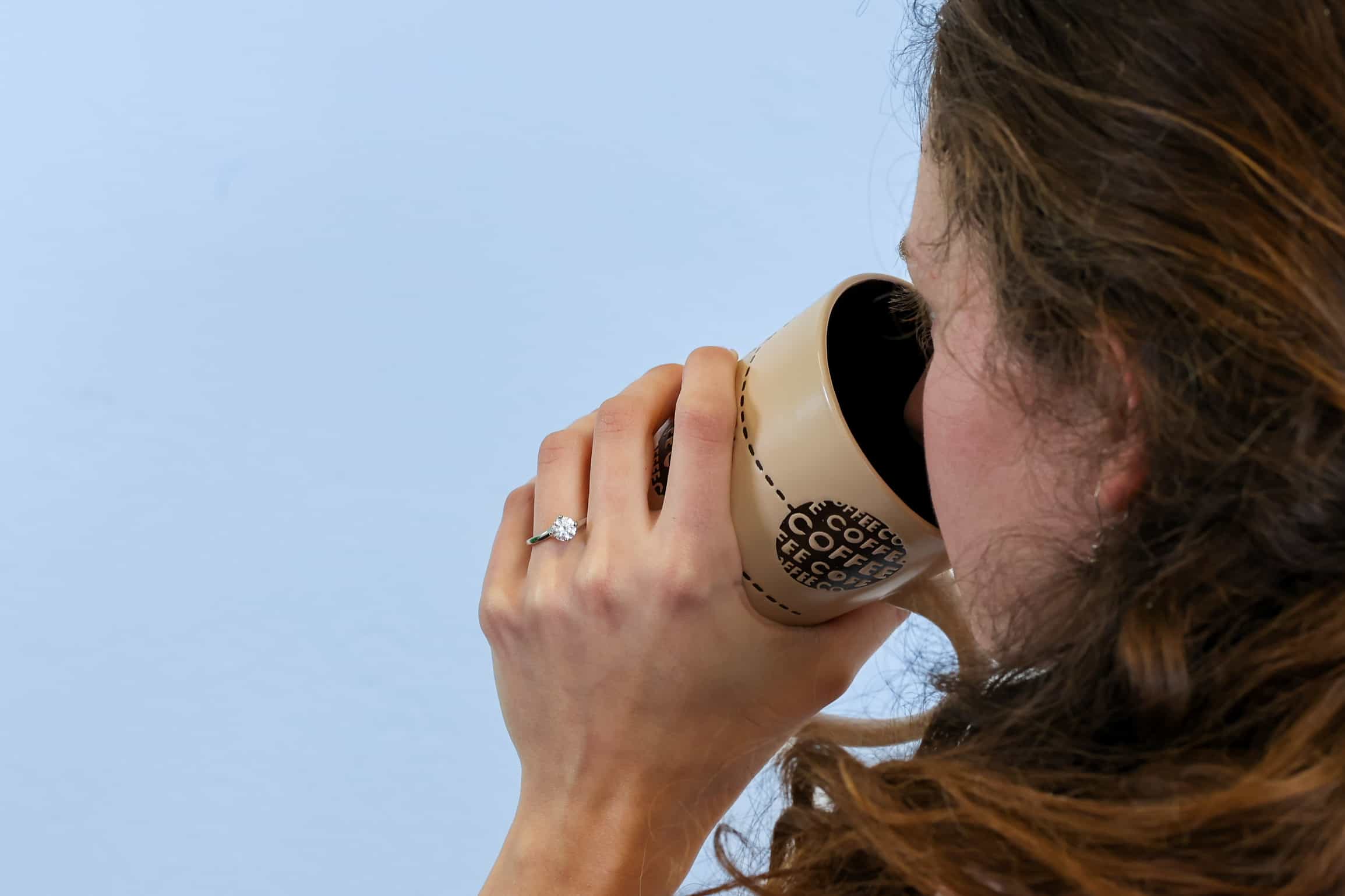 Round cut diamond solitaire style engagement ring