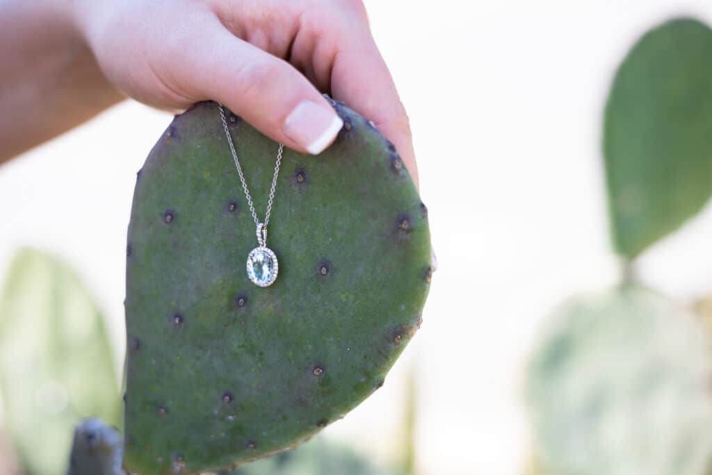 Aquamarine pendant jewelry with an elegant halo 