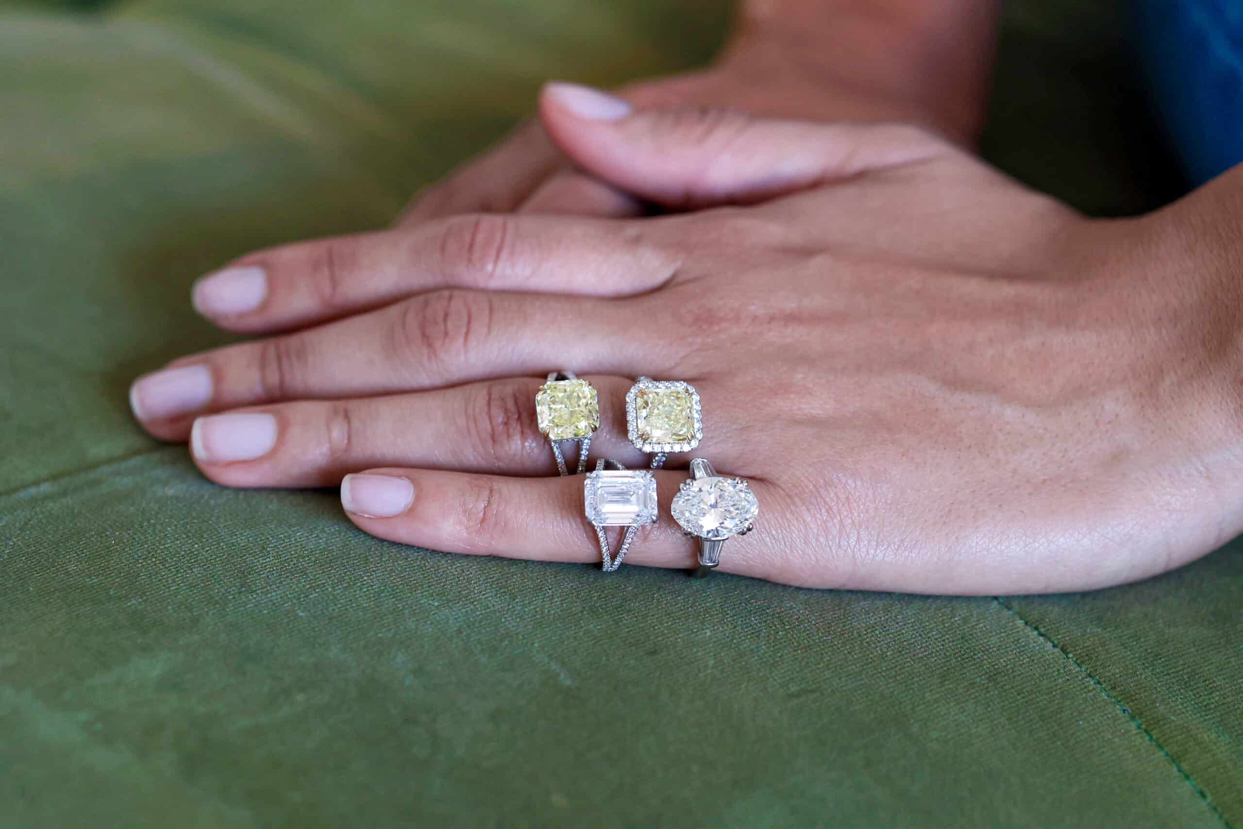 different diamond shapes set in custom-made rings by Abe Mor