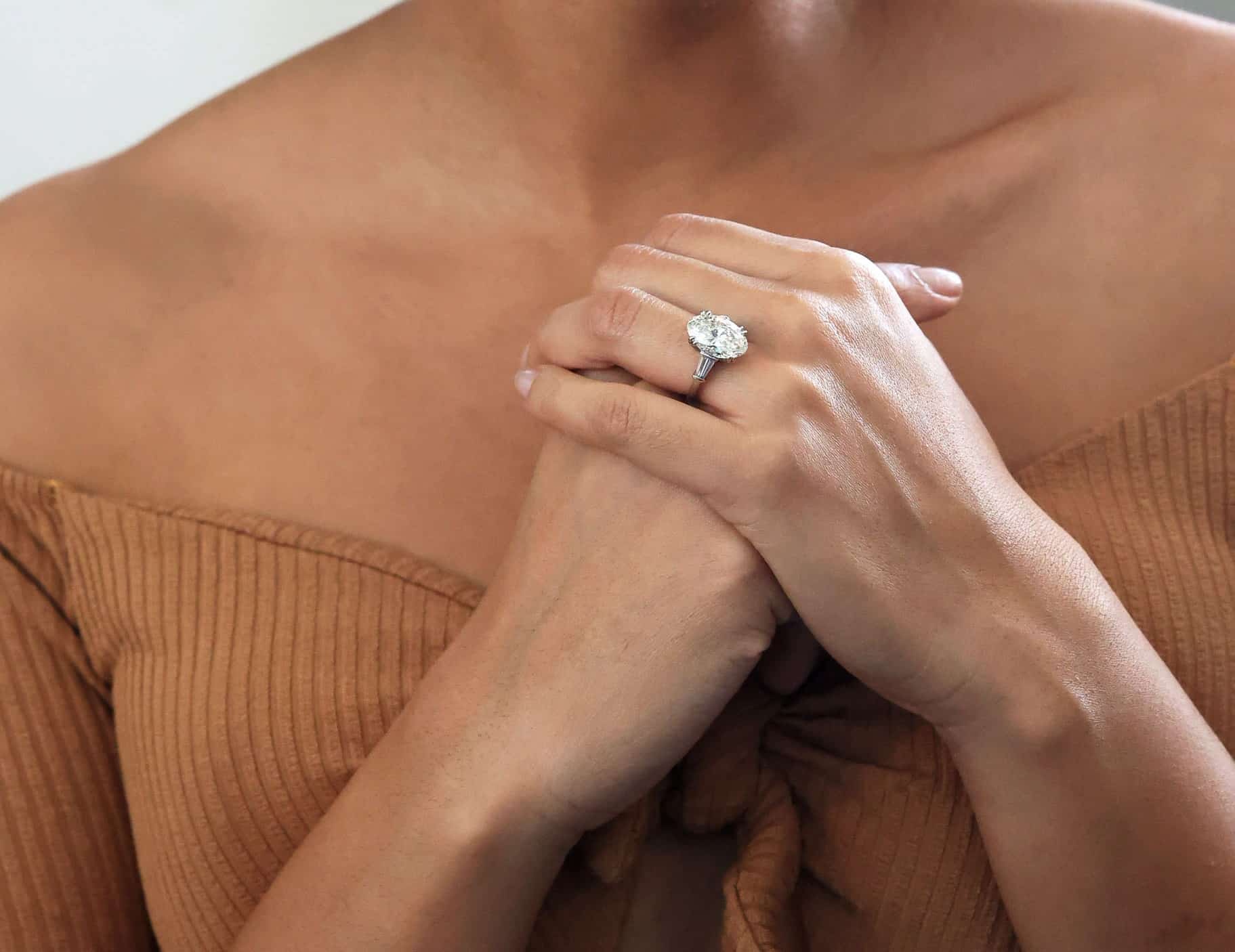 baguette setting with an oval cut center diamond from Abe Mor