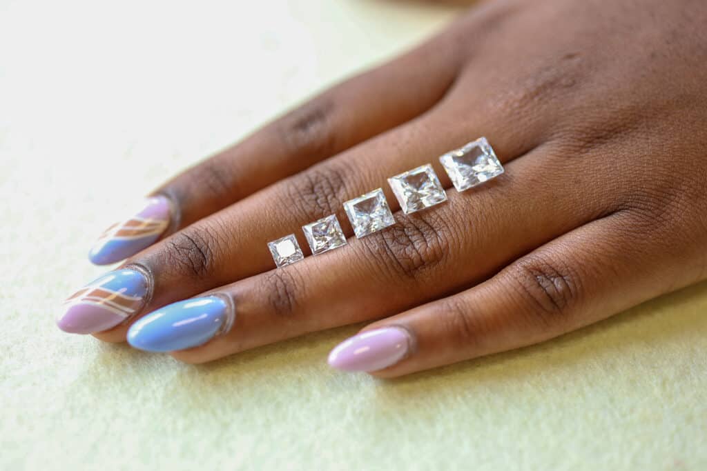 Princess cut diamonds of different carat weights
