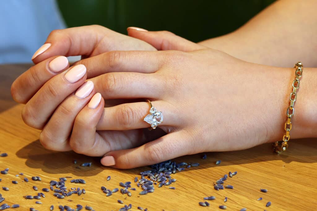 pear shape in a three stone ring