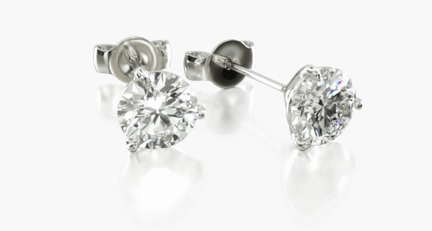 Round cut diamond studs in a martini setting 