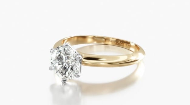 Six Prong Knife Edge Solitaire Ring in yellow gold