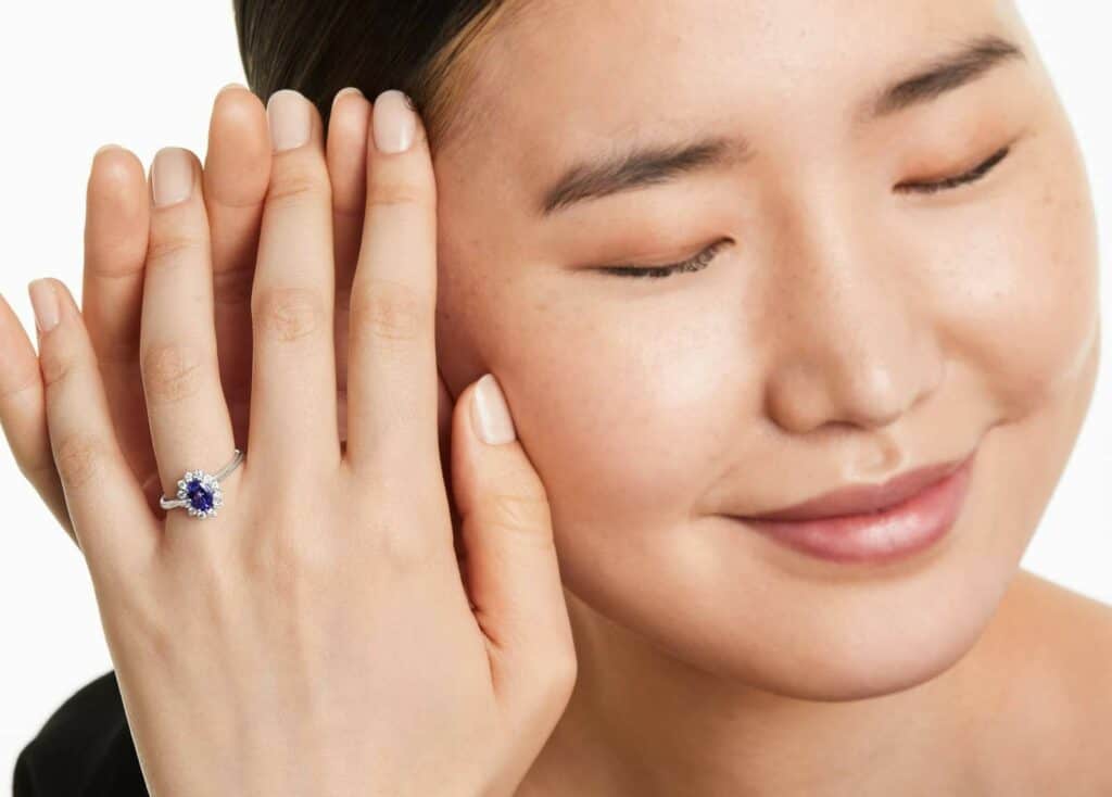 Oval Sunburst Halo Tanzanite And Diamond Ring