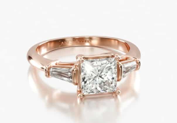 three stone ring with baguettes on each side