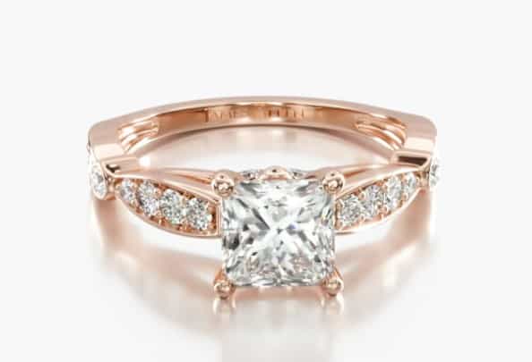 rose gold setting with a princess cut diamond center