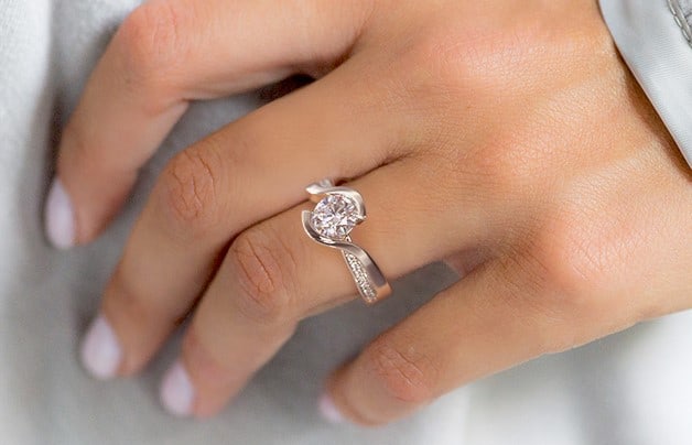 Wide band Engagement Ring in tension style with bypass