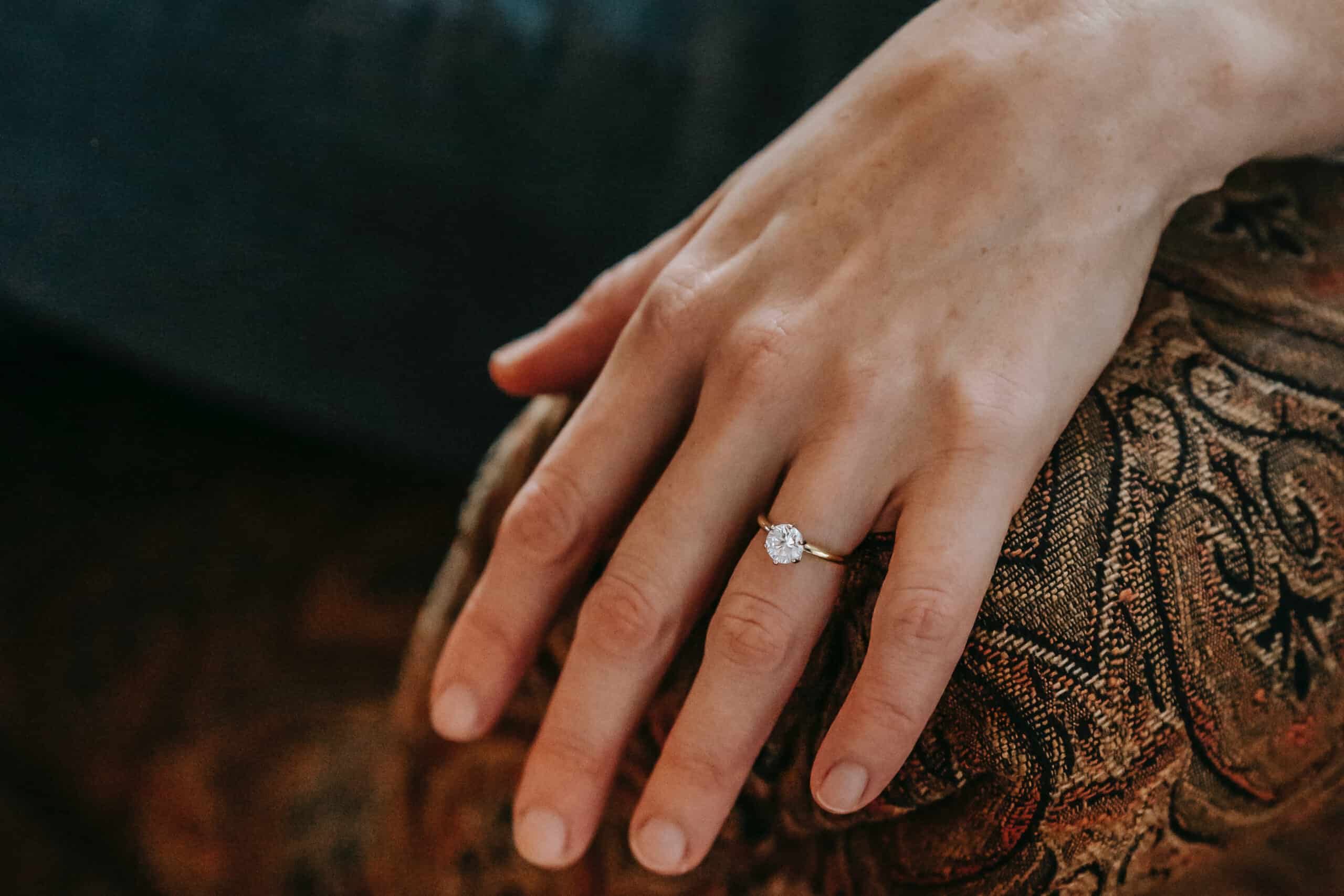 Yellow gold solitaire diamond ring