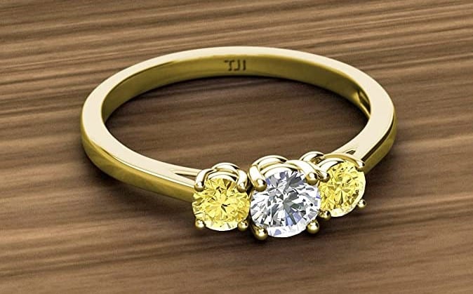 Yellow sapphire three stone ring
