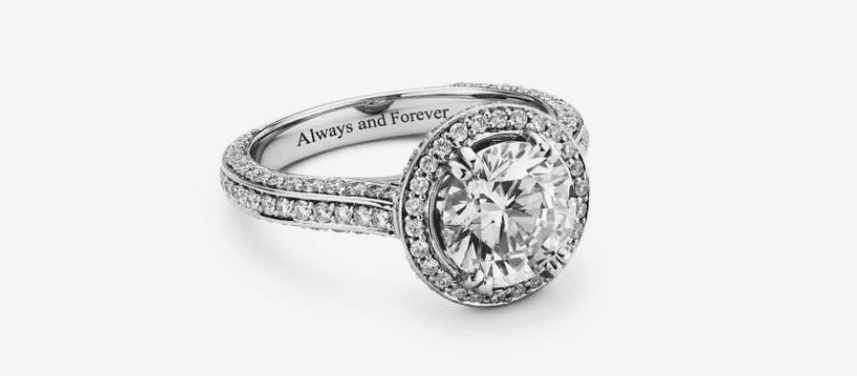 A custom engraved engagement ring