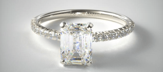 pave setting with an emerald cut center diamond