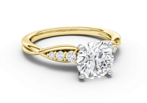 Beautiful yellow gold twisted shank setting with three diamonds on each side